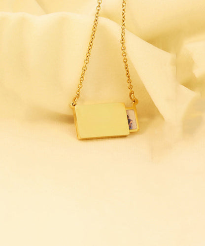 Novelty Gold Stainless Steel Graphic Pulling Type Pendant Necklace