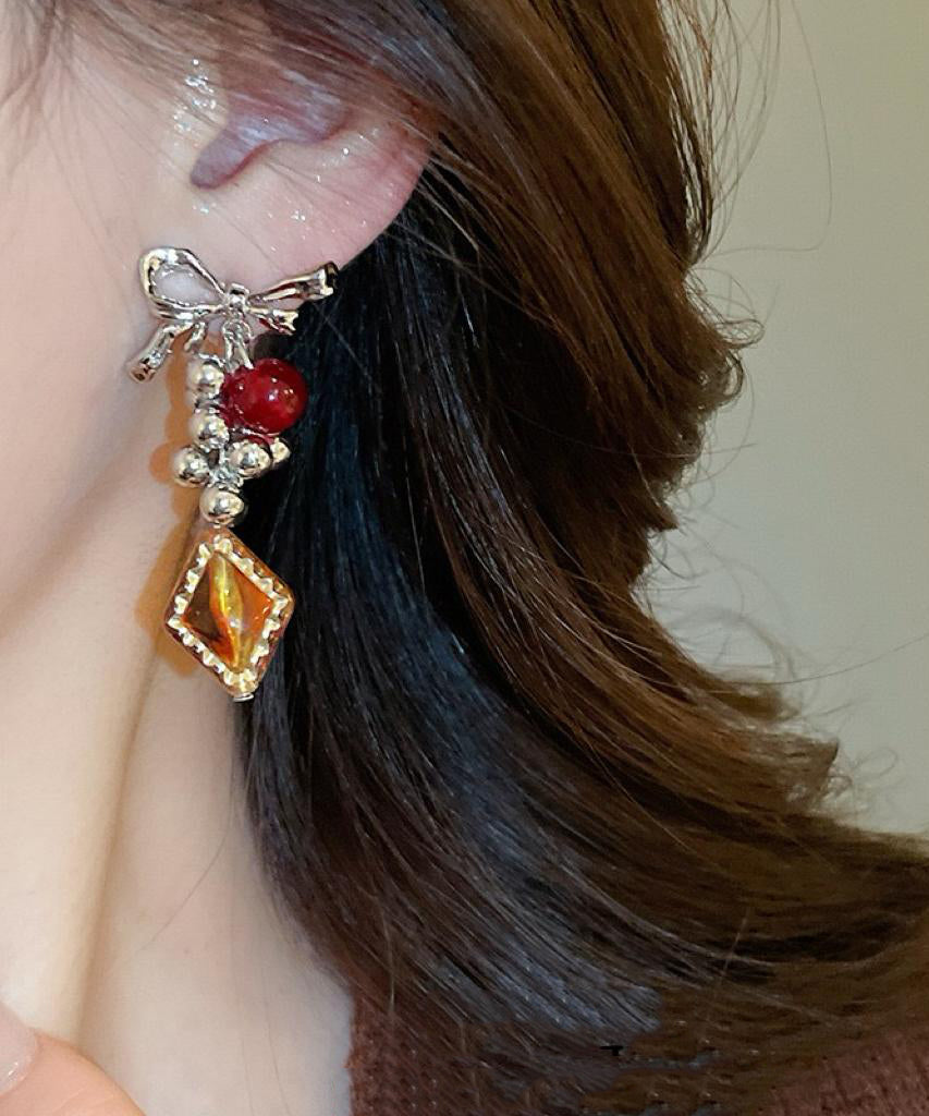 Acrylic Alloy Asymmetrical Amber Bow Tassel Drop Earrings