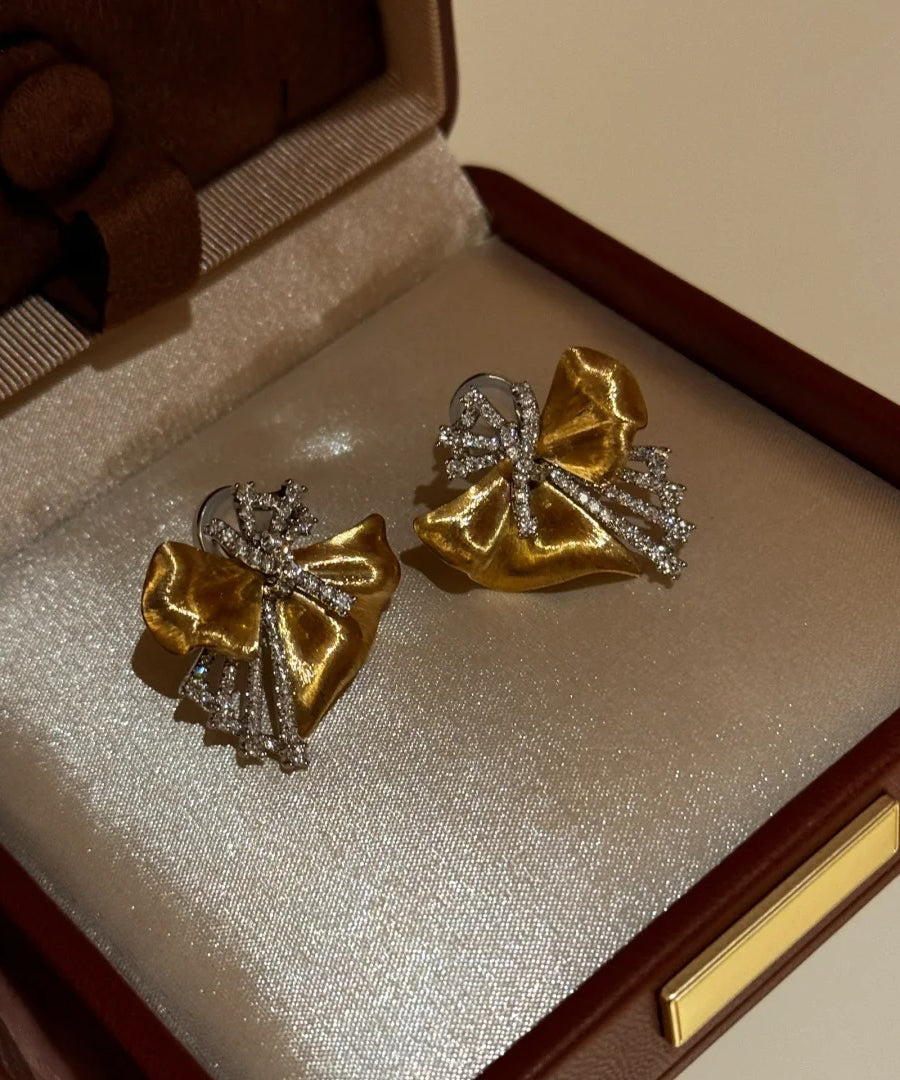 Gold Copper Zircon Asymmetrical Bow Stud Earrings