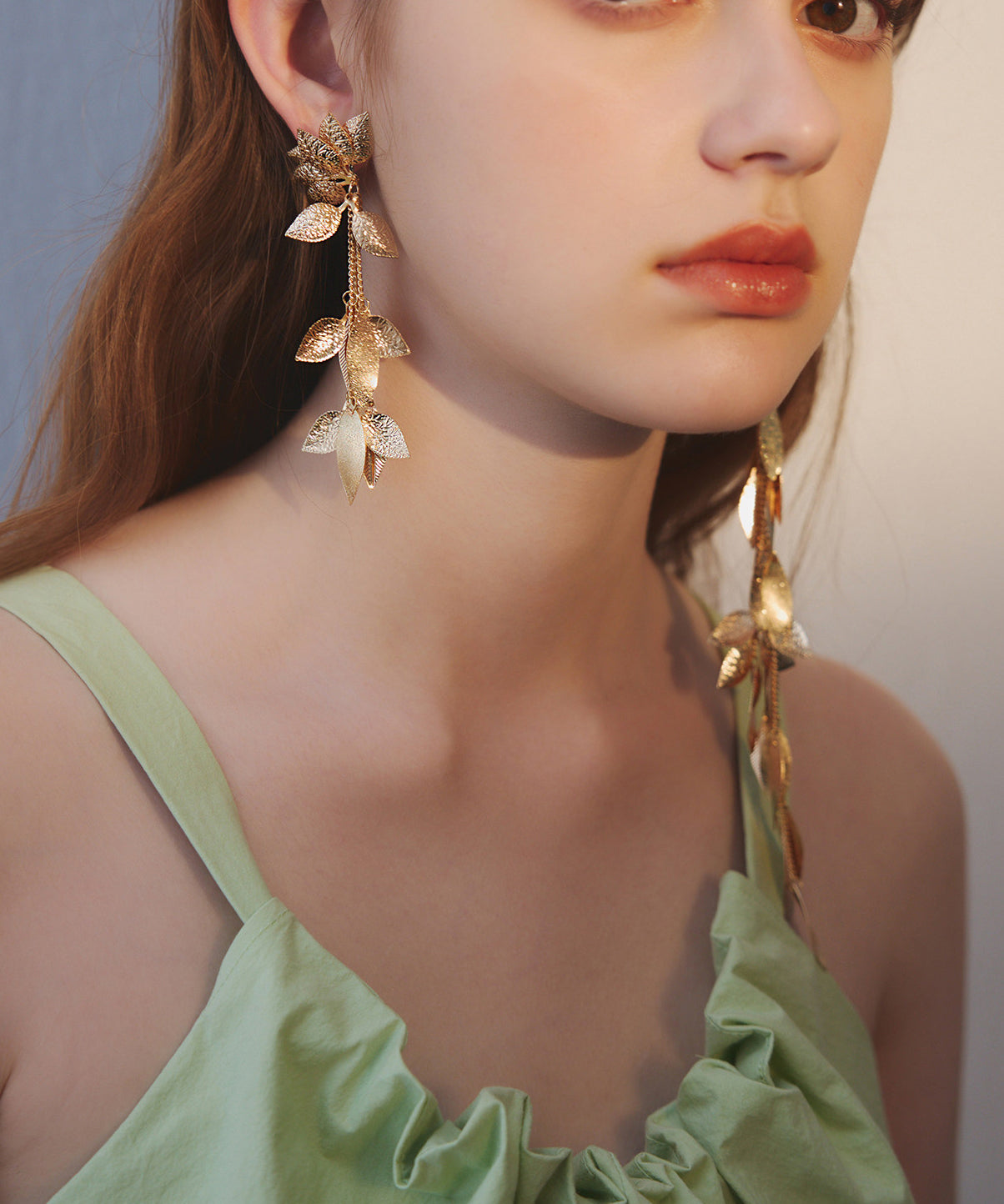 Low High Design Leaf Tasseled Metal Drop Earrings