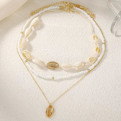 Layered Pearl and Shell Necklace