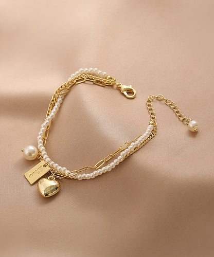 Vogue Gold Metal Alloy Pearl Graphic Love Tassel Charm Braceletfine Silk Sterling Silver Broken Silver Gypsophila Necklace Et008