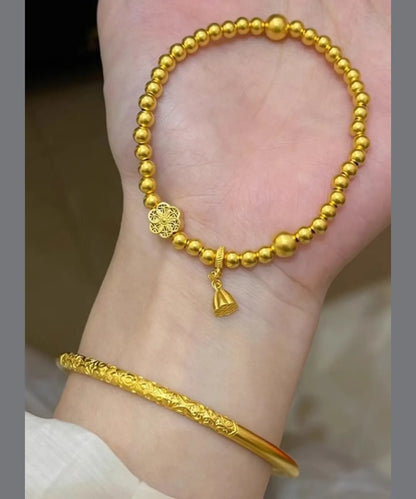 Gold Ancient Gold Bangle and Charm Bracelet Two Piece Set