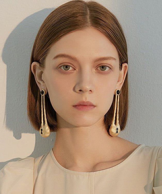 Retro Gold Hollow Out Copper Loose Drop Earrings