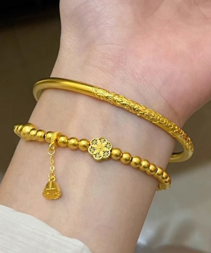 Gold Ancient Gold Bangle and Charm Bracelet Two Piece Set