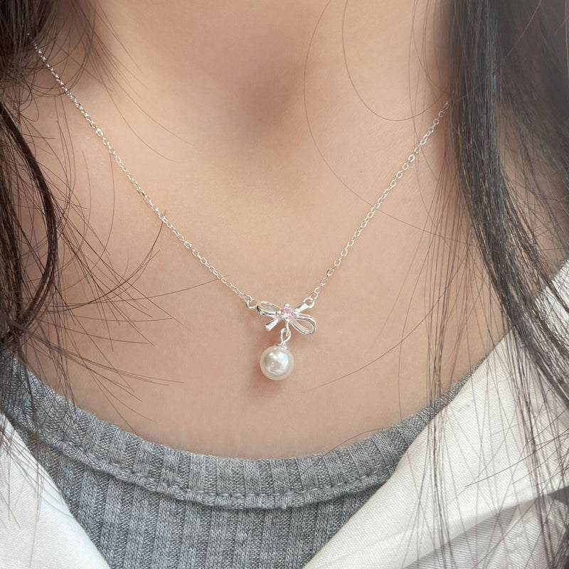 Cady Bow and Pearl Necklace