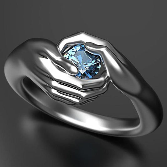 Hands Embracing Ring