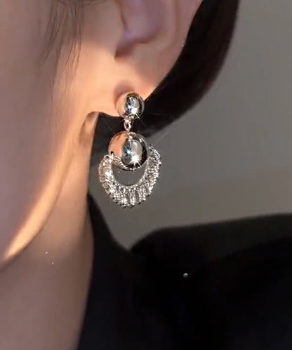 Unique Silk Stergild Silver Ball Tassel Drop Earrings